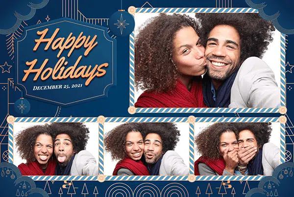 Company holiday party guests at the photo booth
