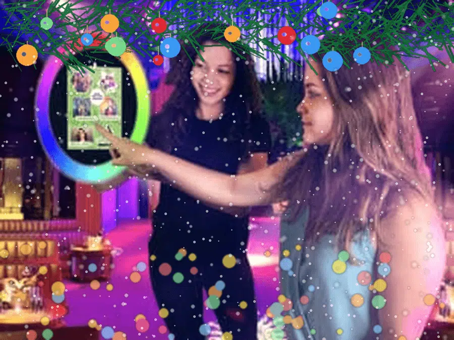 Roaming photo booth attendant capturing guests at their tables