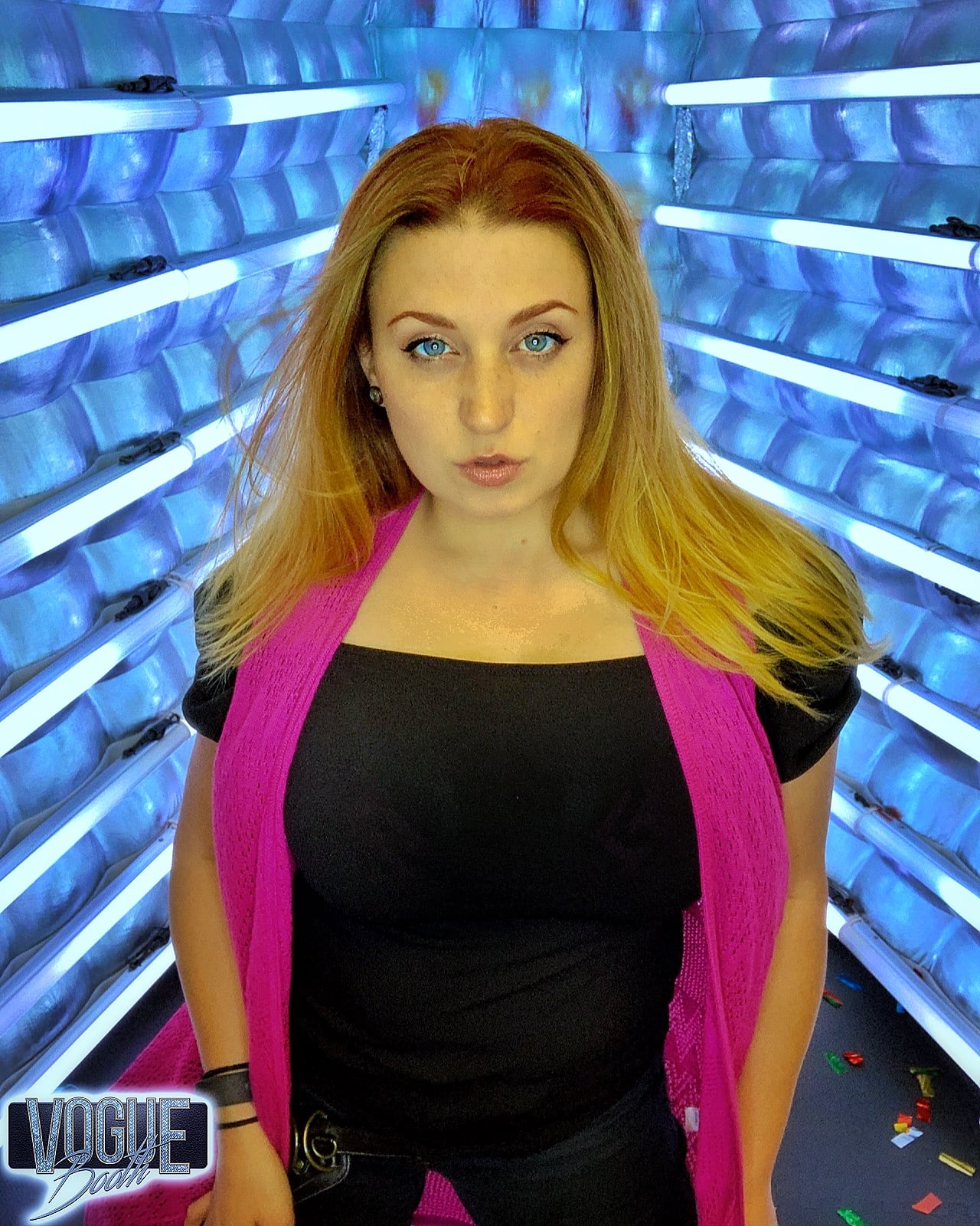 Fashion-style portrait inside the Vogue Booth with cool blue LED lighting